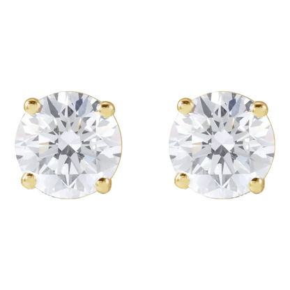 Pair of gold stud earrings with diamonds