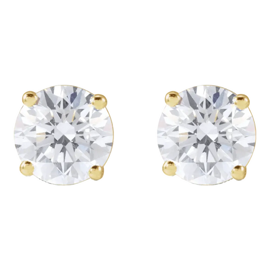 Pair of gold stud earrings with diamonds