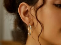 10K Two Tone Gold Oval Twist Hoop Earrings